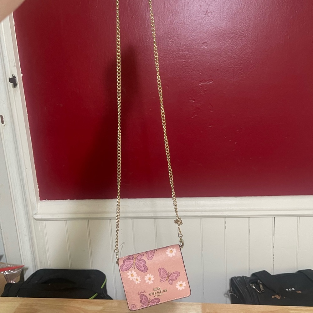 Coach Pink Crossbody Bag with Decorative Patterns